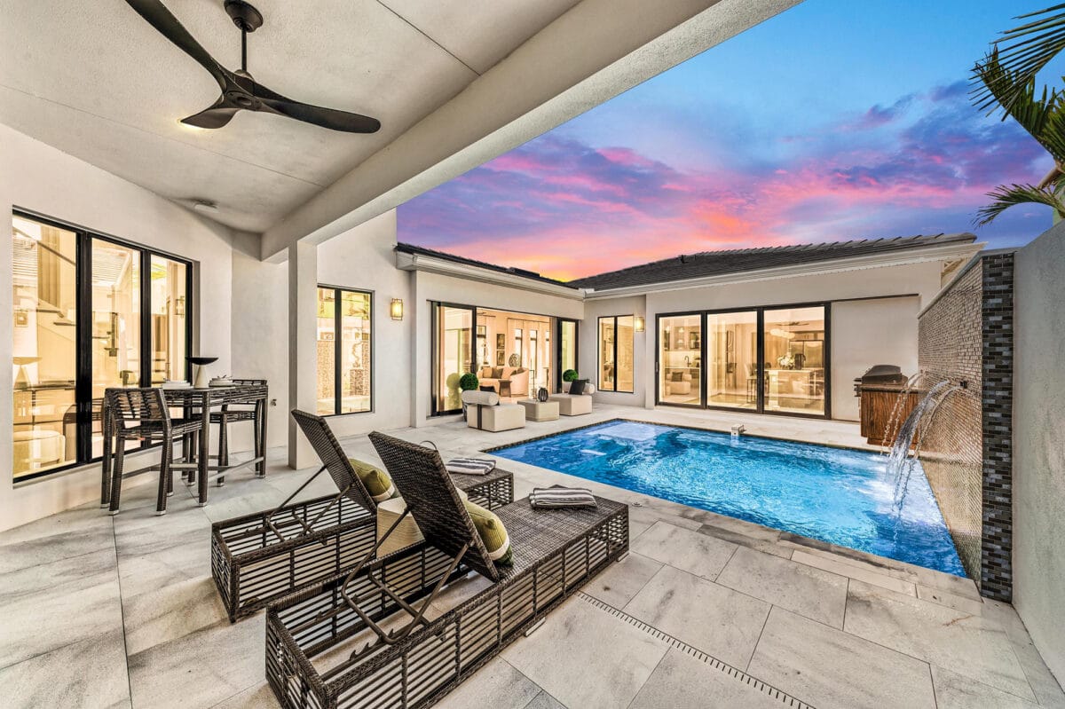 Medallion Home model home lanai and pool at sunset
